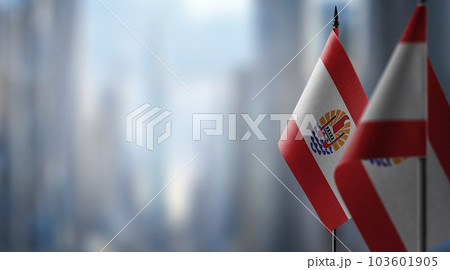 Small flags of the French Polynesia on an abstract blurry background Small flags of the French Polynesia on an abstract blurry background 103601905