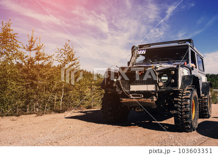 4x4 jeep SUV car stands at the start before an off-road race 4x4 jeep SUV car stands at the start before an off-road race 103603351