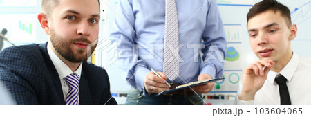 Encouraged team of interns brainstorming corporate training Encouraged team of interns brainstorming corporate training 103604065