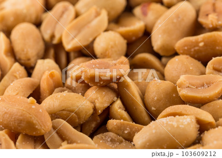 large amount of peeled salted peanuts 103609212