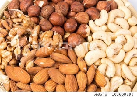 Set of nuts in basket Set of nuts in basket 103609599