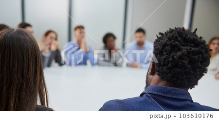 Executive Team Listening to Contrary Views from Colleague 103610176