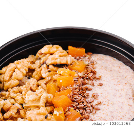 Bowl of granola isolated on white 103613368