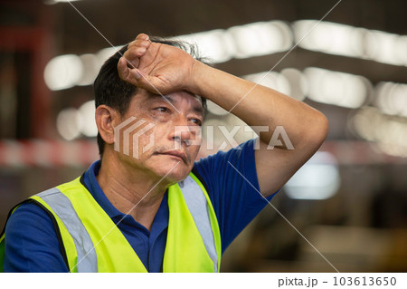 Senior man raise your hands above your head Feeling tired from work. Unhappy, discouraged, Senior man raise your hands above your head Feeling tired from work. Unhappy, discouraged, 103613650