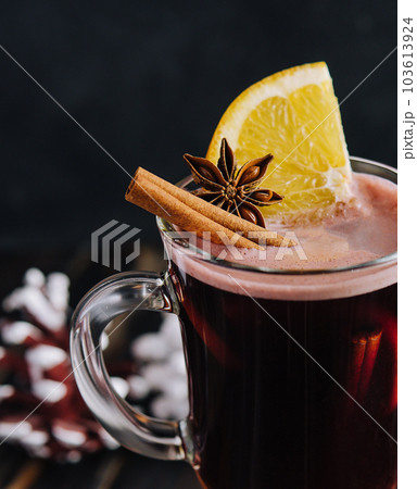 Winter hot drink mulled wine with cinnamon and lemon Winter hot drink mulled wine with cinnamon and lemon 103613924