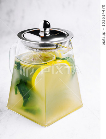 Tasty cold ice tea on table 103614470