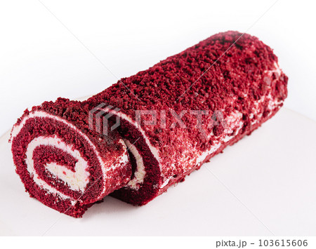 Sponge Swiss roll on white plate Sponge Swiss roll on white plate 103615606