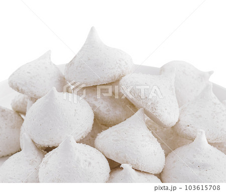Bowl of meringue cookies isolated on white 103615708