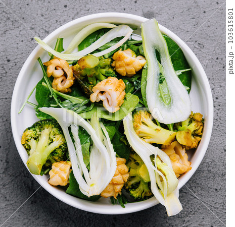 Salad with squid, fennel and baked broccoli 103615801