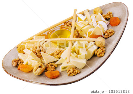 cheese plate with walnuts and honey cheese plate with walnuts and honey 103615818