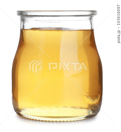 Jar of organic honey isolated on white 103616097