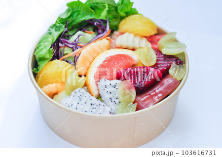 fruit and vegetable salad or orange, dragon fruit and lettuce salad 103616731