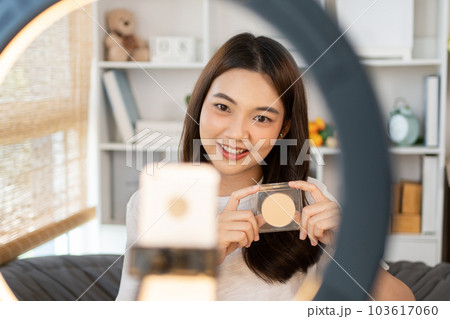 Beautiful women with social media influences recommend products and make-up accessories to be more beautiful, Recording vlog video live streaming, Online business of beauty bloggers. Beautiful women with social media influences recommend products and make-up accessories to be more beautiful, Recording vlog video live streaming, Online business of beauty bloggers. 103617060