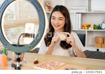 Beautiful women with social media influences recommend products and make-up accessories to be more beautiful, Recording vlog video live streaming, Online business of beauty bloggers. Beautiful women with social media influences recommend products and make-up accessories to be more beautiful, Recording vlog video live streaming, Online business of beauty bloggers. 103617061