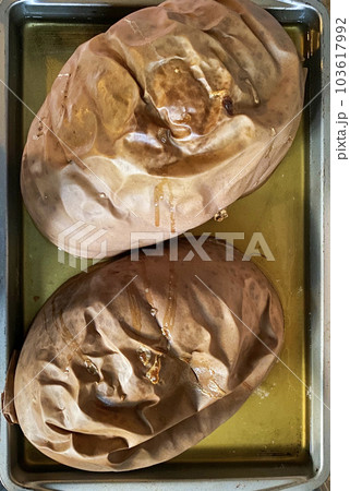 Cheese pumpkin cut in half and freshly baked Cheese pumpkin cut in half and freshly baked 103617992