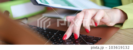Woman manager typing statistics data of financial report Woman manager typing statistics data of financial report 103619132
