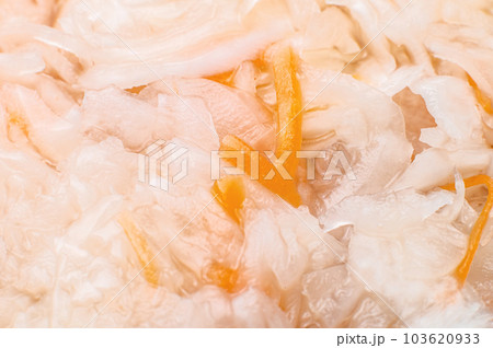 sauerkraut, sauerkraut, top view background. Close-up of fresh homemade sauerkraut. Sauerkraut finely shredded raw cabbage fermented with various lactic acid bacteria sauerkraut, sauerkraut, top view background. Close-up of fresh homemade sauerkraut. Sauerkraut finely shredded raw cabbage fermented with various lactic acid bacteria 103620933