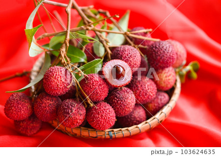fresh ripe lychee fruit tropical fruit peeled lychees slice in Thailand, lychees on basket 103624635