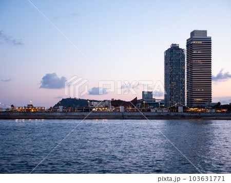 Torre Mapfre and Hotel Arts in evening time Torre Mapfre and Hotel Arts in evening time 103631771