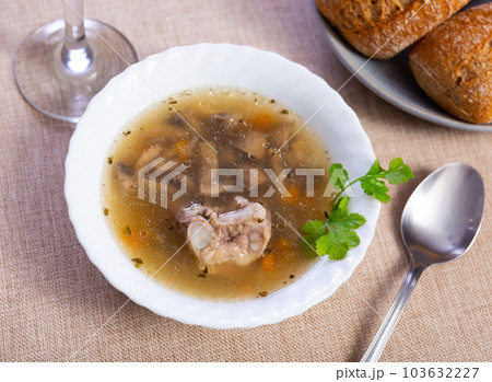 Homemade soup with mushrooms, pork, vegetables and pearl barley Homemade soup with mushrooms, pork, vegetables and pearl barley 103632227