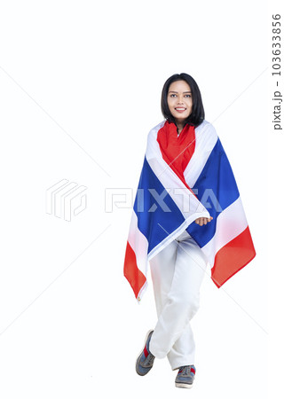 Asian women celebrate Thailand's independence day on 05 December by holding the Thailand flag Asian women celebrate Thailand's independence day on 05 December by holding the Thailand flag 103633856