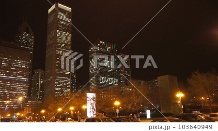 CHICAGO, ILLINOIS, UNITED STATES - DEC 12, 2015: Crown Fountain sculpture consisting of two 50-foot-tall LED towers and a reflecting pool during a winter night at Millennium Park in Downtown 103640949