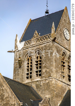 the historical church of Sainte Mere Eglise in Normandy, France the historical church of Sainte Mere Eglise in Normandy, France 103641779