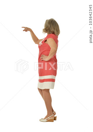 senior woman pointing with finger isolated on white background 103642345