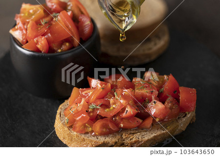 Bruschetta starter with tomato Bruschetta starter with tomato 103643650