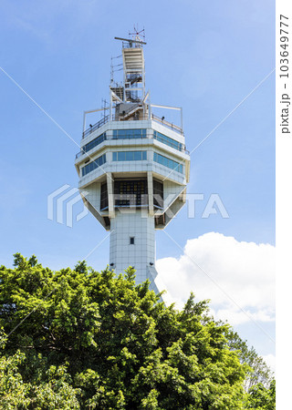 View of the Vessel Traffic Service(VTS) tower in Port of Kaohsiung, Taiwan. it was built to control vessels entering and exiting the port of Kaohsiung. 103649777