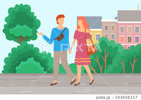 Couple walking in the city park. Cute happy smiling girl and guy on date are communicating Couple walking in the city park. Cute happy smiling girl and guy on date are communicating 103656317