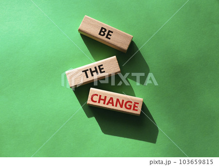 Be the change symbol. Concept word Be the change on wooden blocks. Beautiful green background. Business and Be the change concept. Copy space 103659815
