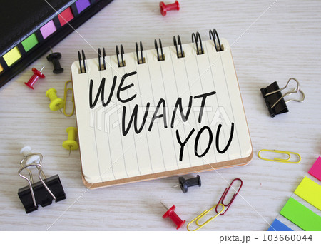 We want you symbol. Concept words We want you on white notebook. Beautiful wooden background. Business and We want you concept. Copy space. 103660044