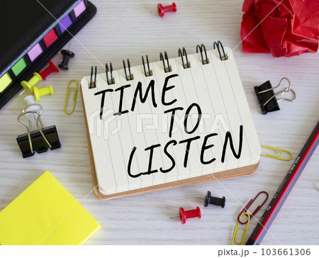 Time to listen symbol. Concept words Time to listen on white notebook. Beautiful wooden background. Business and Active listening concept. Copy space. 103661306