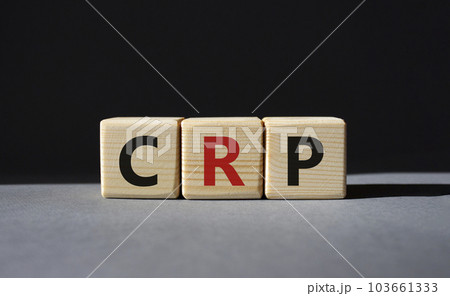 CRP - C-Reactive Protein Test symbol. Wooden cubes with word CRP. Beautiful grey background. Medical and C-Reactive Protein Test concept. Copy space. 103661333