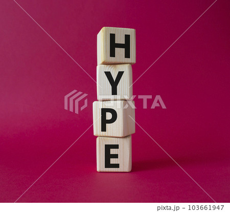 Hype symbol. Concept word Hype on wooden cubes. Beautiful red background. Business and Hype concept. Copy space. 103661947