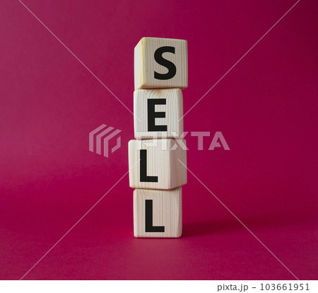 Sell symbol. Concept word Sell on wooden cubes. Beautiful red background. Business and Sell concept. Copy space. 103661951