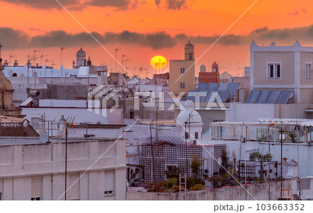 Picturesque sunset over the rooftops of Spanish Cadiz. 103663352