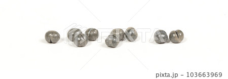 Split shot lead weights for fishing, isolated on white background