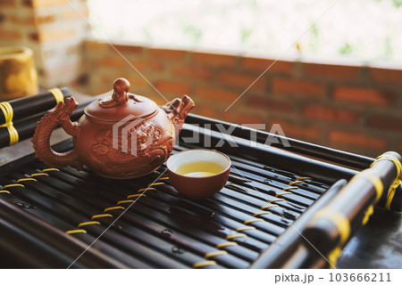 Tea set a wooden table for tea ceremony background Tea set a wooden table for tea ceremony background 103666211