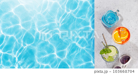 Refreshing cocktails by the pool on a sunny day Refreshing cocktails by the pool on a sunny day 103668704