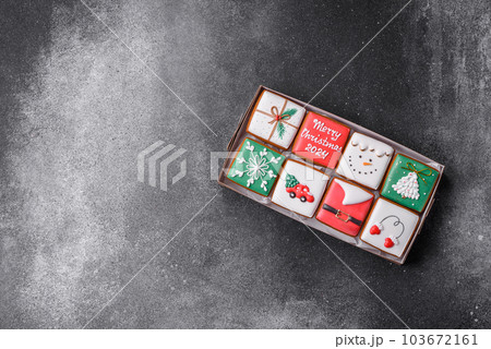 Beautiful colored Christmas gingerbread cookies for the design and decoration Beautiful colored Christmas gingerbread cookies for the design and decoration 103672161