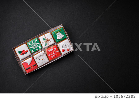 Beautiful colored Christmas gingerbread cookies for the design and decoration 103672285