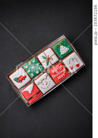 Beautiful colored Christmas gingerbread cookies for the design and decoration 103672286
