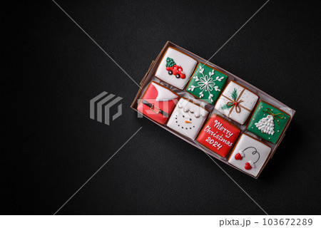 Beautiful colored Christmas gingerbread cookies for the design and decoration 103672289