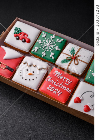 Beautiful colored Christmas gingerbread cookies for the design and decoration 103672293
