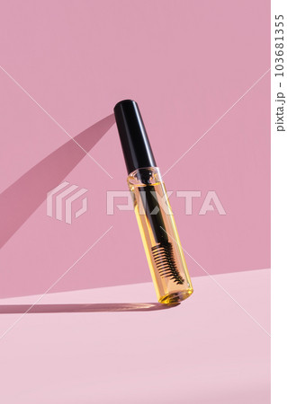 Cosmetic oil for the growth of eyebrows and eyelashes with a brush. 103681355