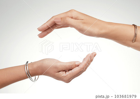 Support is a give and take. Cropped shot of two unrecognizable women posing with their hands cupped above each other. 103681979