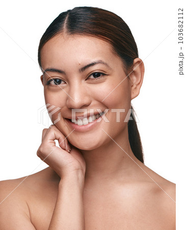You dont need makeup to feel good about your skin. a beautiful young woman posing against a white background. 103682112