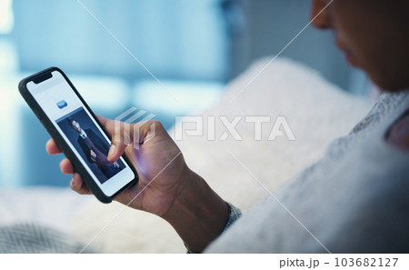 Website, dating app and phone screen with hand of woman for social media, date and communication. Digital, technology and internet with closeup of person in bed at home for profile, user and contact 103682127